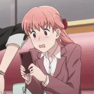 girl confused with phone on hand.gif